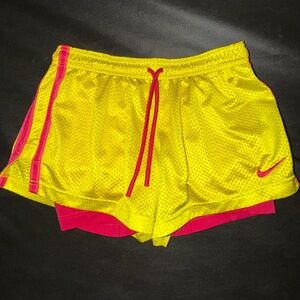 Nike Women's Vibrant Yellow and Pink Athletic Shorts